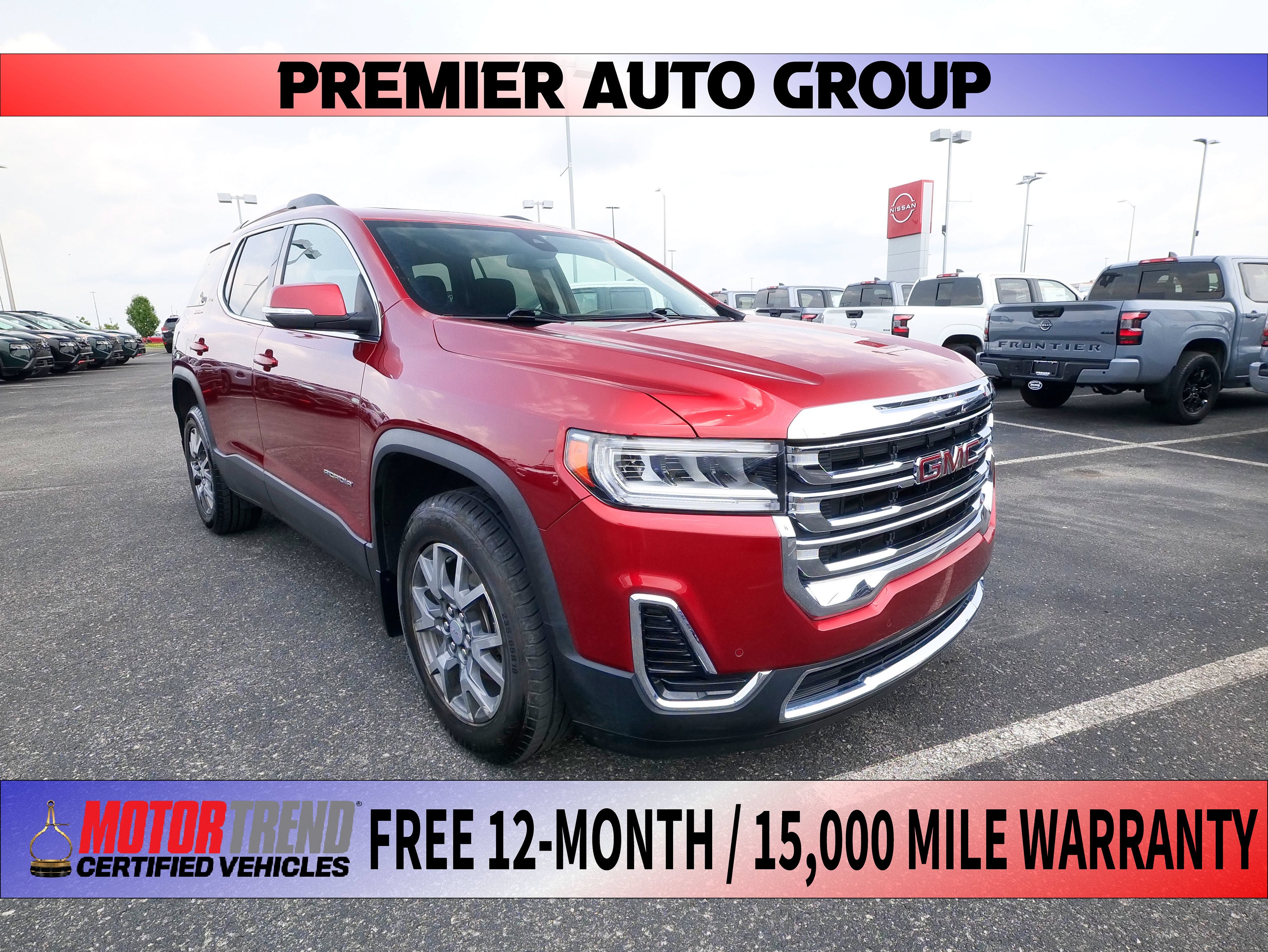 2023 GMC Acadia SLE in Volcanic Red Tintcoat — front three-quarter view