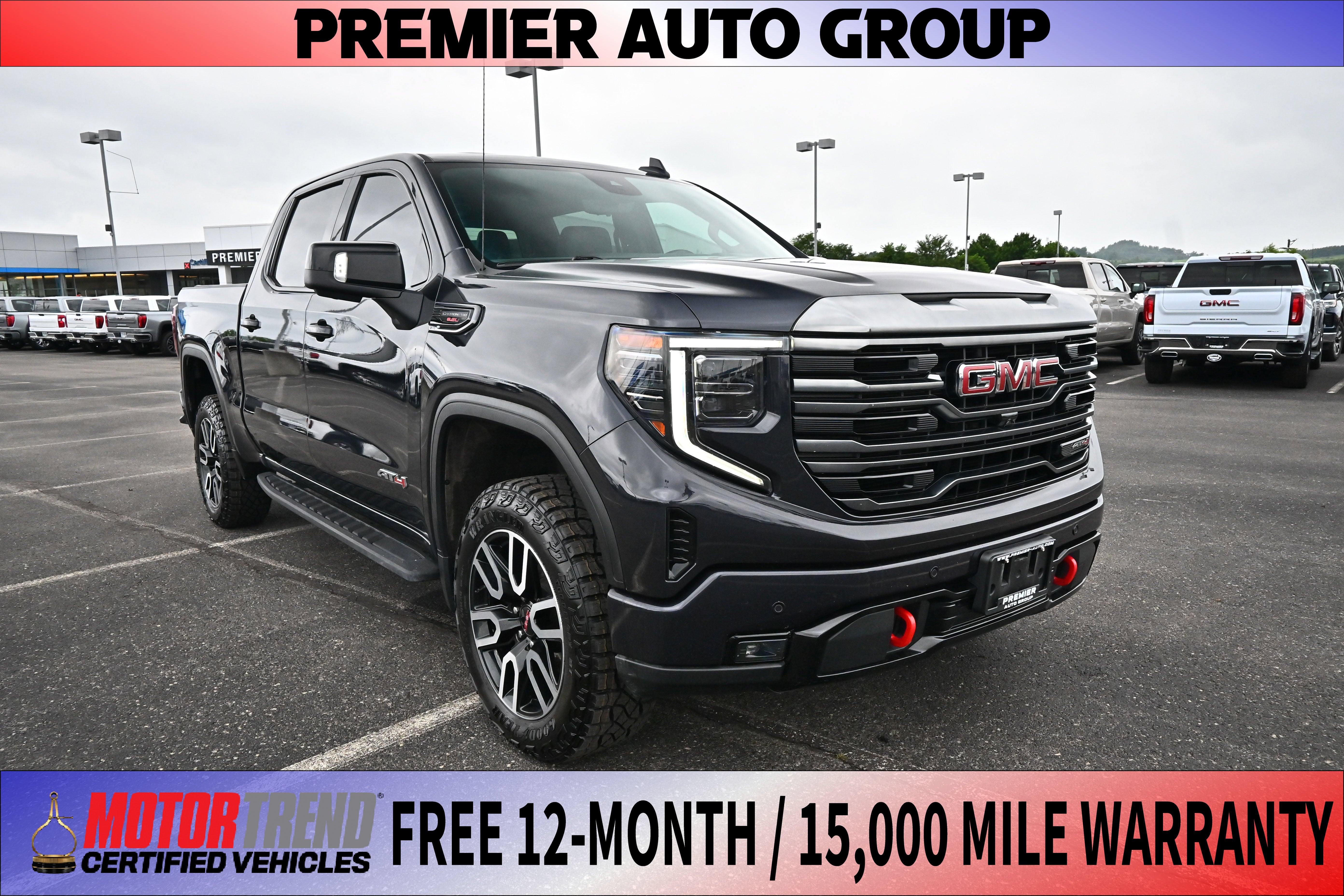 2024 GMC Sierra 1500 AT4 in Titanium Rush Metallic — front three-quarter view